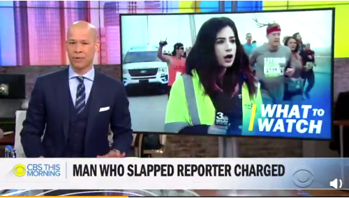 美国跑者拍女记者屁股被捕 辩解称只是一时失手